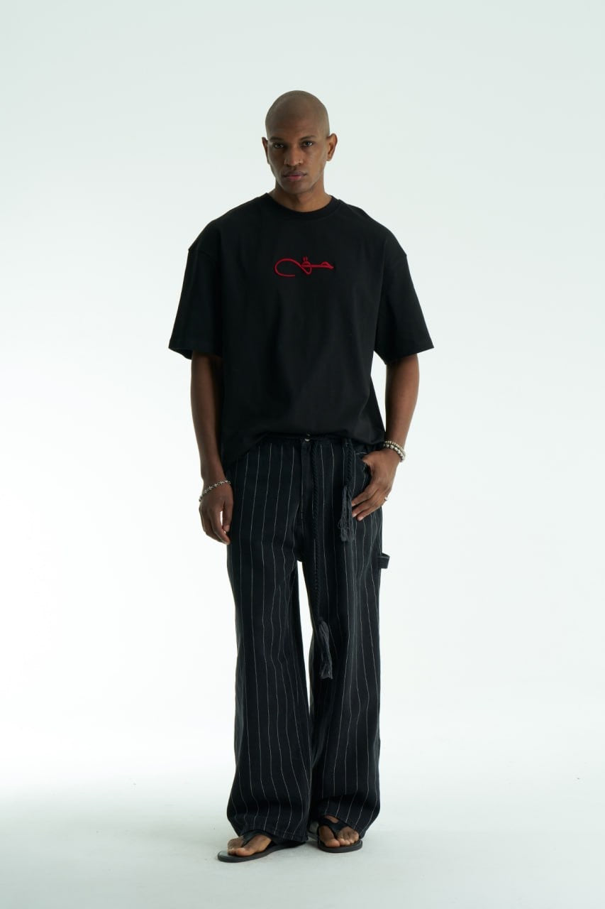 Premium Oversize T-Shirt | Arabische Kalligraphie حق