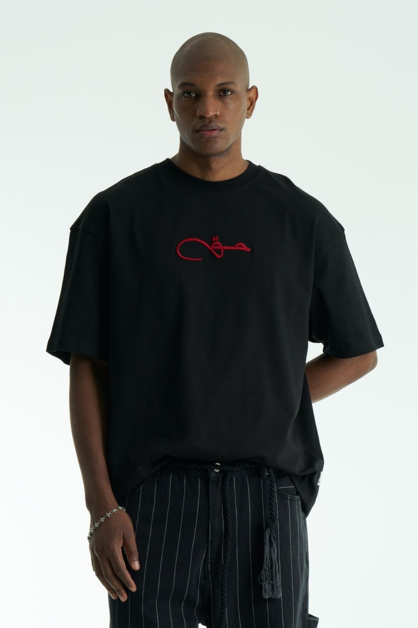 Premium Oversize T-Shirt | Arabische Kalligraphie حق