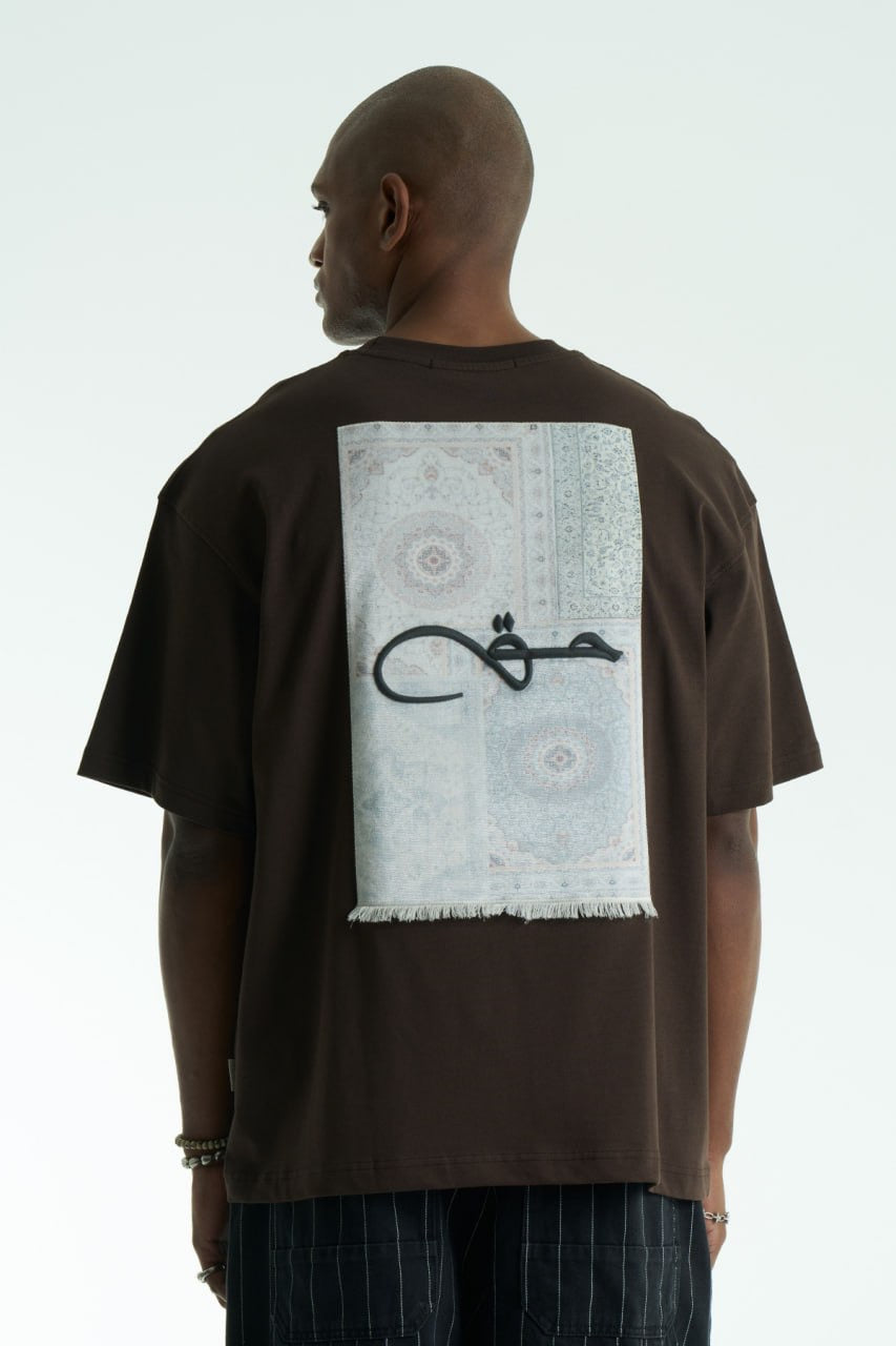 Premium Oversize T-Shirt | Arabische Kalligraphie حق