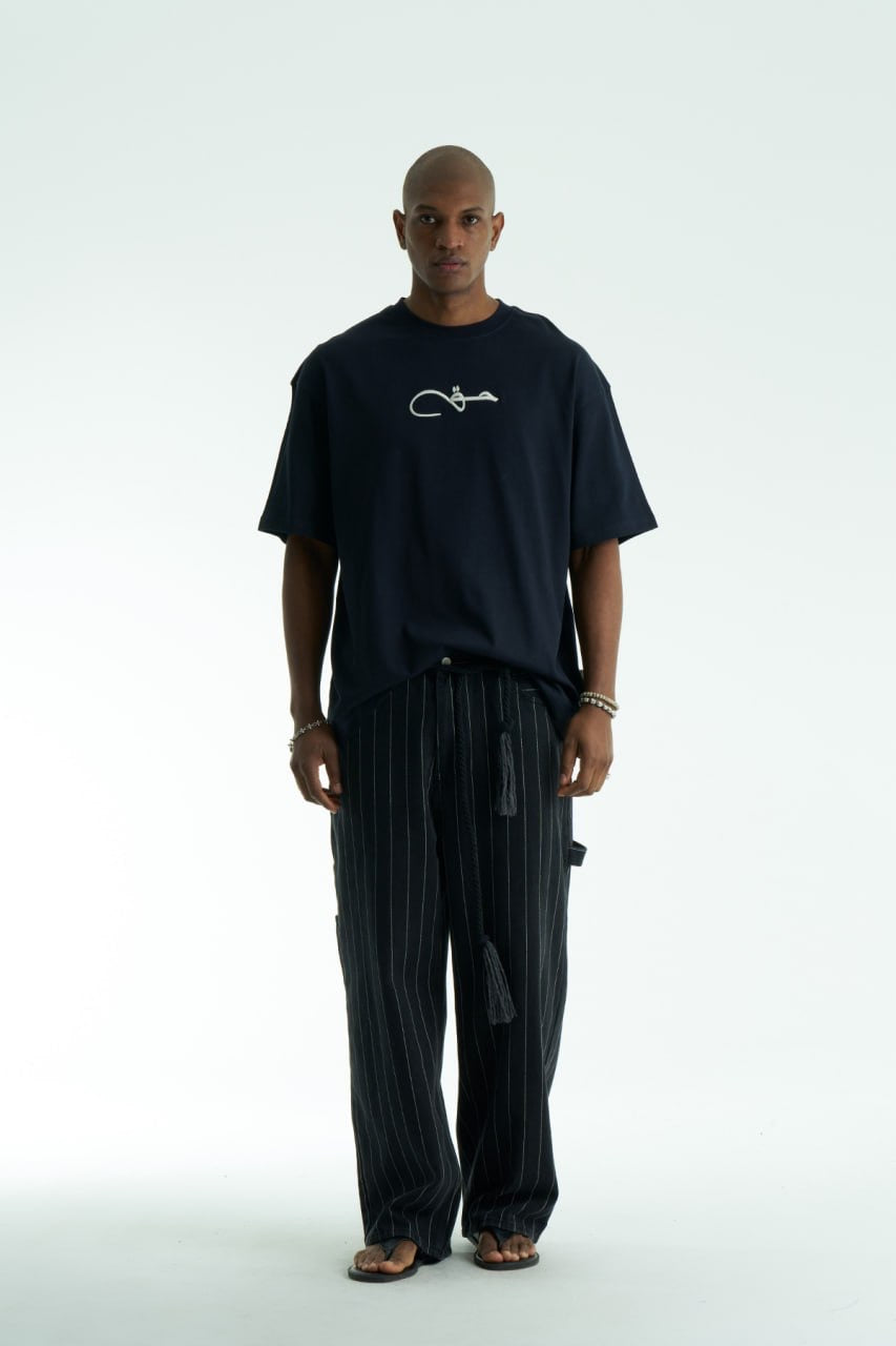 Premium Oversize T-Shirt | Arabische Kalligraphie حق